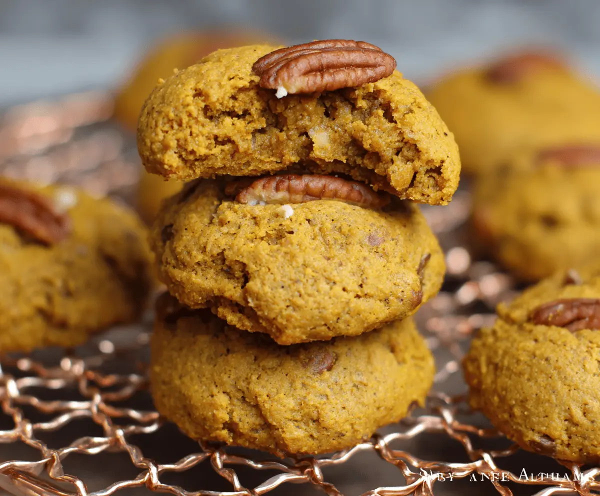 Delicious homemade pumpkin pecan cookies with a golden-brown crust and crunchy pecan topping, perfect for fall treats.